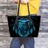 Blue owl sitting on dream catcher leather tote bag