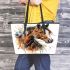 Brown horse with white and black feathers on its head leather tote bag