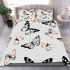 Butterflies and butterfly patterns in soft pink bedding set