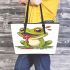 Cartoon cute frog spitting out red liquid leaather tote bag