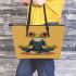 Cartoon frog with big eyes wearing white and brown shoes leaather tote bag