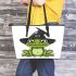 Cartoon green frog with black witch hat leaather tote bag