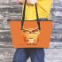 Cartoon owl holding an empty coffee cup leather tote bag