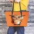 Cartoon owl holding an empty coffee cup leather tote bag