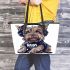 Cartoon yorkshire terrier dog wearing headphones leather tote bag