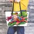 Colorful cartoon tree frog with lily flower leaather tote bag