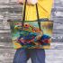 Colorful frog with an eye on its back leaather tote bag