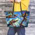 Colorful frogs hanging from tree branches in the jungle leaather tote bag