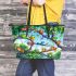 Colorful frogs hanging from tree branches in the jungle leaather tote bag