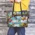 Colorful frogs hanging from tree branches in the jungle leaather tote bag
