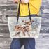 Cute baby deer in the snow leather totee bag