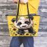 Cute baby panda with sunflowers on a yellow leather tote bag