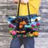 Cute black and tan dachshund in the garden with colorful tulips leather tote bag