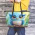 Cute blue owl with big eyes cartoon style leather tote bag