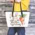 Cute bunny sitting on top of an carrot hello spring leather tote bag