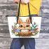 Cute cartoon baby bunny with big eyes sitting leather tote bag