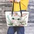 Cute cartoon bunny with big eyes sitting on the flowers leather tote bag