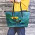 Cute cartoon frog holding on to the stem leaather tote bag