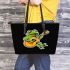 Cute cartoon frog playing guitar in a simple drawing leaather tote bag