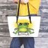 Cute cartoon frog sitting in a lawn chair with big sunglasses on leaather tote bag