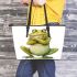 Cute cartoon frog with its front legs crossed leaather tote bag