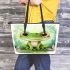 Cute cartoon illustration of a little frog with big eyes leaather tote bag