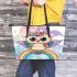 Cute cartoon owl with big eyes wearing a colorful leather tote bag