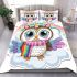 Cute cartoon owl with big eyes wearing a colorful unicorn horn bedding set