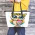 Cute cartoon owl with leopard headband holding leather tote bag