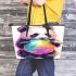 Cute cartoon panda bear holding a rainbow colored leather tote bag