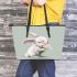 Cute cartoon rabbit holding daisies leather tote bag