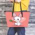 Cute cartoon rabbit playing with a carrot leather tote bag