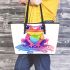 Cute cartoon rainbow frog sitting on a water puddle leaather tote bag
