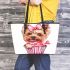 Cute cartoon yorkshire terrier inside a pink cupcake leather tote bag