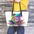 Cute colorful frog sitting on water leaather tote bag