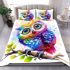 Cute colorful owl with big eyes sitting on a tree branch bedding set