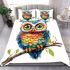 Cute colorful owl with big eyes sitting on a tree branch bedding set