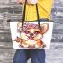 Cute corgi puppy with pink roses and a butterfly leather tote bag