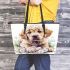Cute golden retriever puppy with daisies and easter eggs leather tote bag