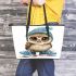 Cute little owl wearing blue shoes and a hat leather tote bag