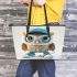 Cute little owl wearing blue sneakers and a cap leather tote bag