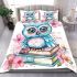 Cute owl sitting on books in pink and blue colors with flowers bedding set