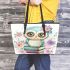 Cute owl sitting on books in the style of pastel colors leather tote bag