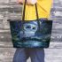 Cute owl with big blue eyes perched leather tote bag