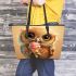 Cute owl with big eyes holding an ice cream leather tote bag