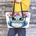 Cute owl with big eyes pink flowers on its head leather tote bag