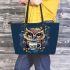 Cute owl with big yellow eyes holding a coffee cup leather tote bag