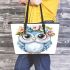 Cute owl with flowers on its head leather tote bag