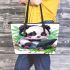 Cute panda wearing headphones and playing computer leather tote bag