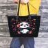 Cute panda wearing headphones is listening to music leather tote bag
